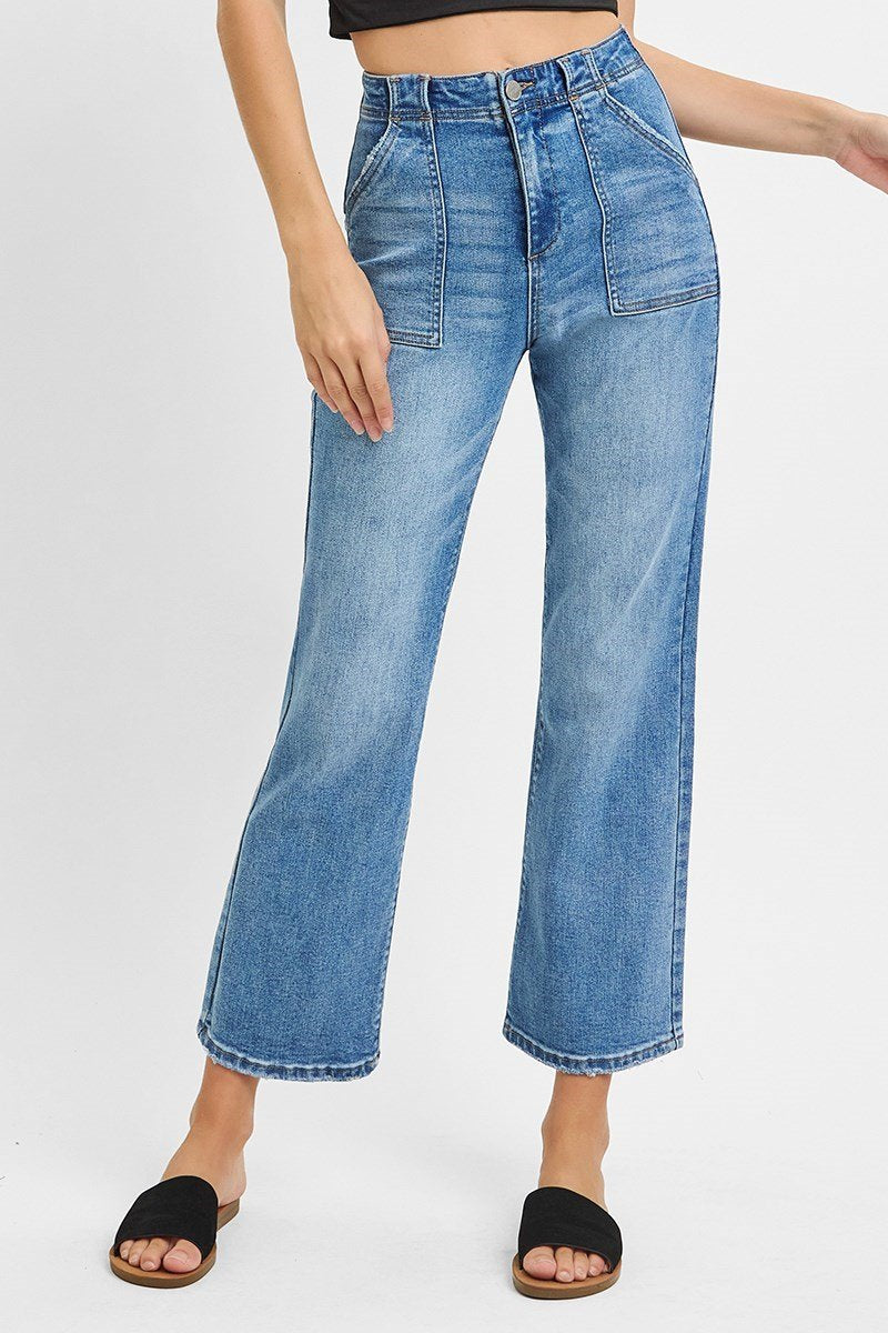 Medium denim wash high rise ankle flare jeans from RISEN JEANS for a stylish coastal boutique clothing look.