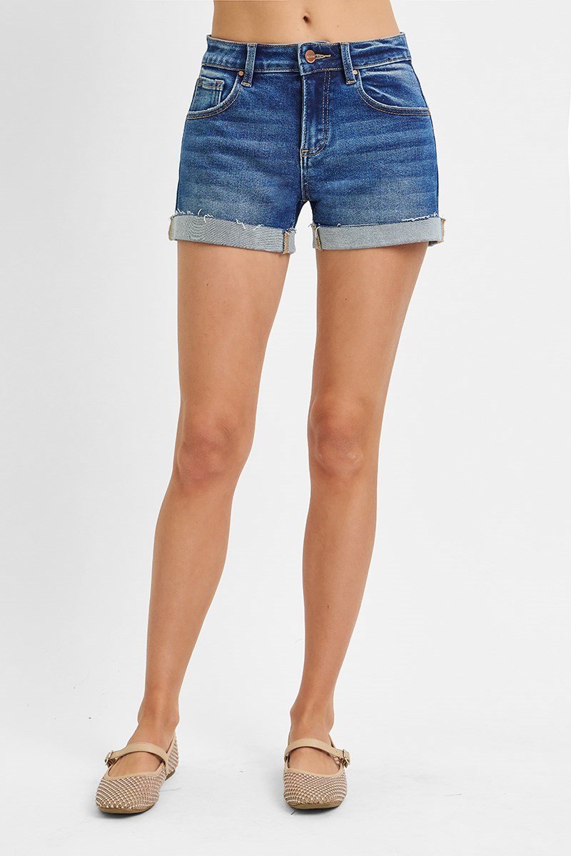 Dark denim low rise cuffed shorts for women, perfect for the beach and coastal boutique clothing style.
