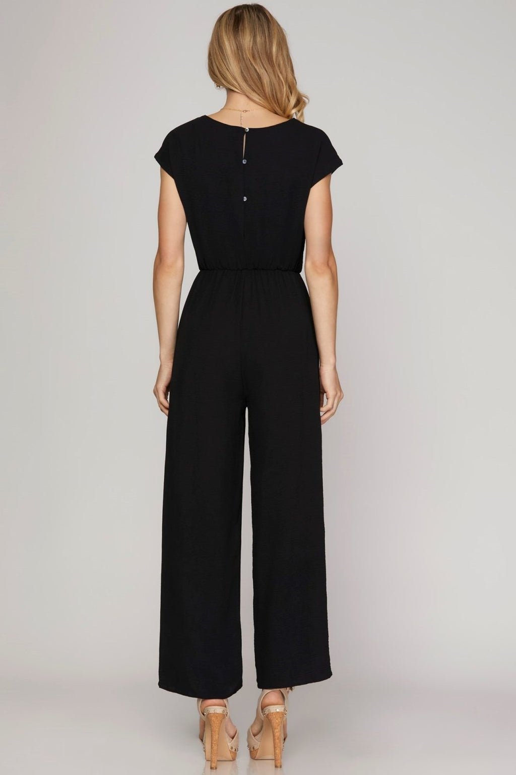 Back view of the Favorite Jumpsuit in Black, perfect for coastal boutique clothing and stylish tops for women.