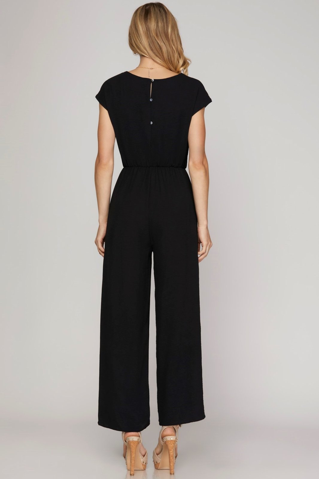 Back view of the Favorite Jumpsuit in Black, perfect for coastal boutique clothing and stylish tops for women.