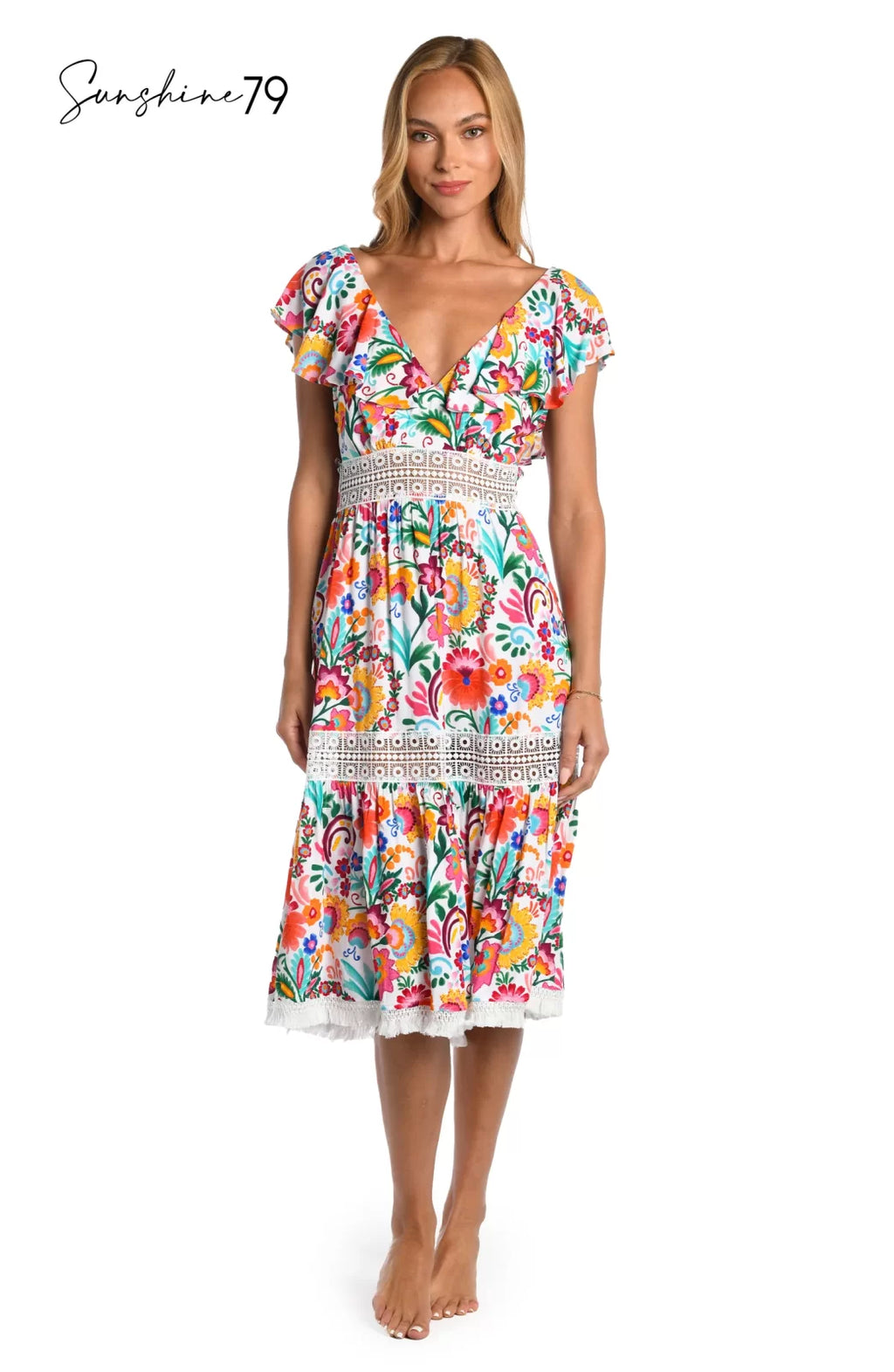 BONITA MIDI DRESS from Raggdoll Boutique features a vibrant Spanish-inspired print and flounce sleeves, perfect for coastal fashion.