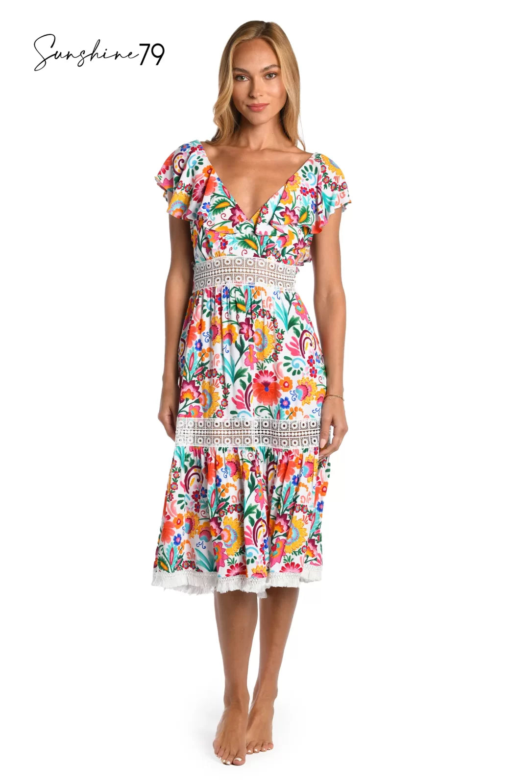 BONITA MIDI DRESS from Raggdoll Boutique features a vibrant Spanish-inspired print and flounce sleeves, perfect for coastal fashion.