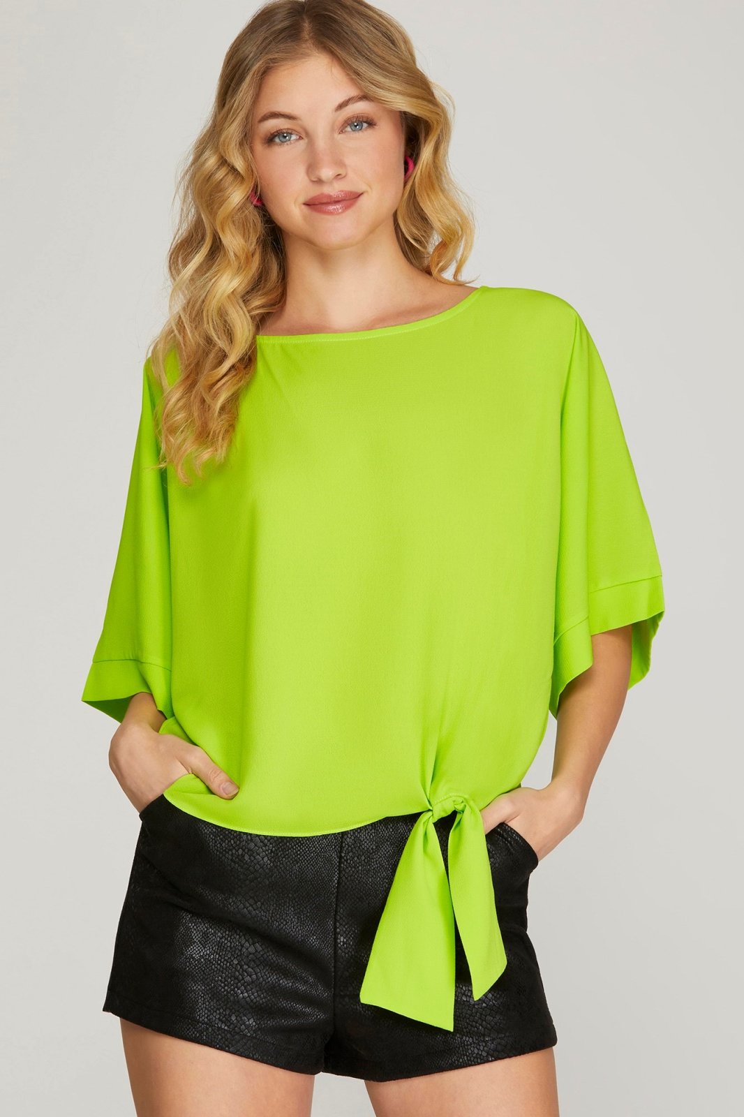 Lime Side-Tie Top displayed with trendy shorts perfect for summer outfits Texas by Raggdoll Boutique.