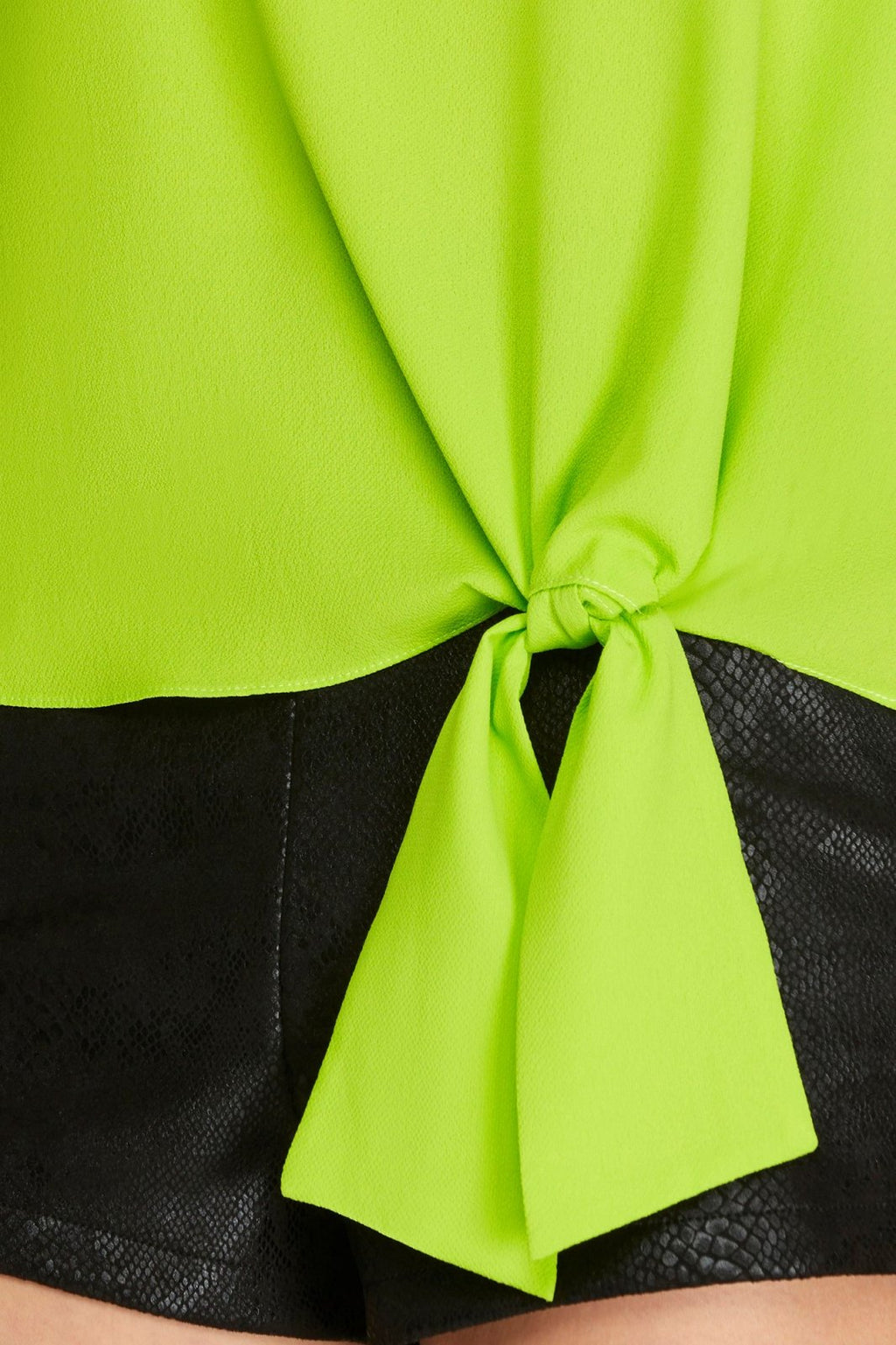 Lime Side-Tie Top detail with knot tie; a trendy essential from Raggdoll Boutique for summer outfits Texas.
