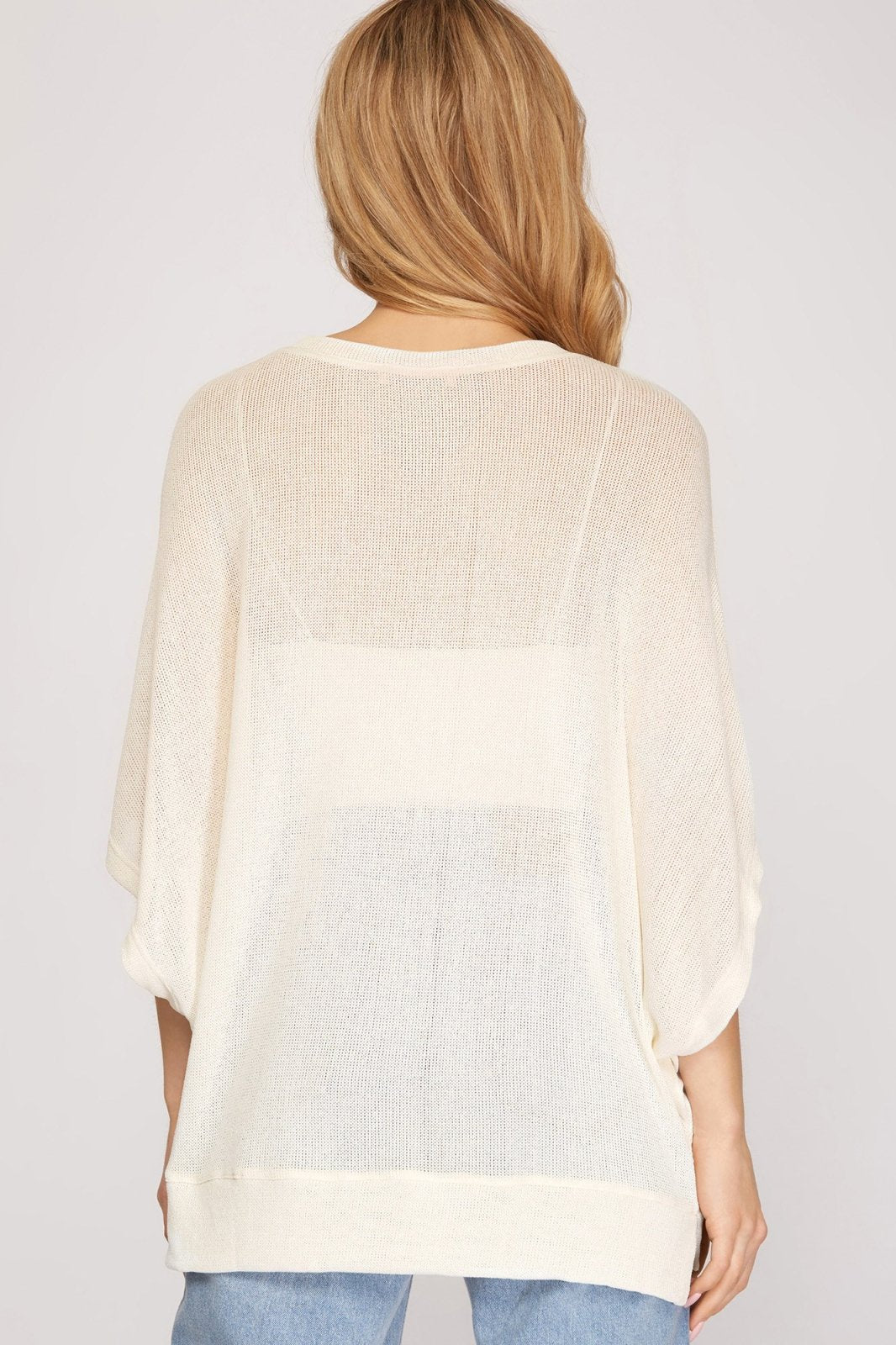 DROP SHOULDER LOW GAGE V NECK KNIT TOP shown from the back, perfect for summer outfits Texas at Raggdoll Boutique.