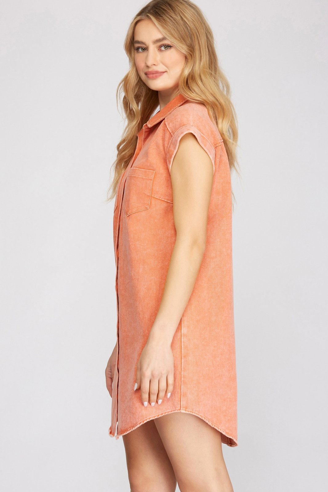 Model wearing the KEEP IT COOL DRESS from Raggdoll Boutique, showcasing trendy coastal style in Port Aransas.