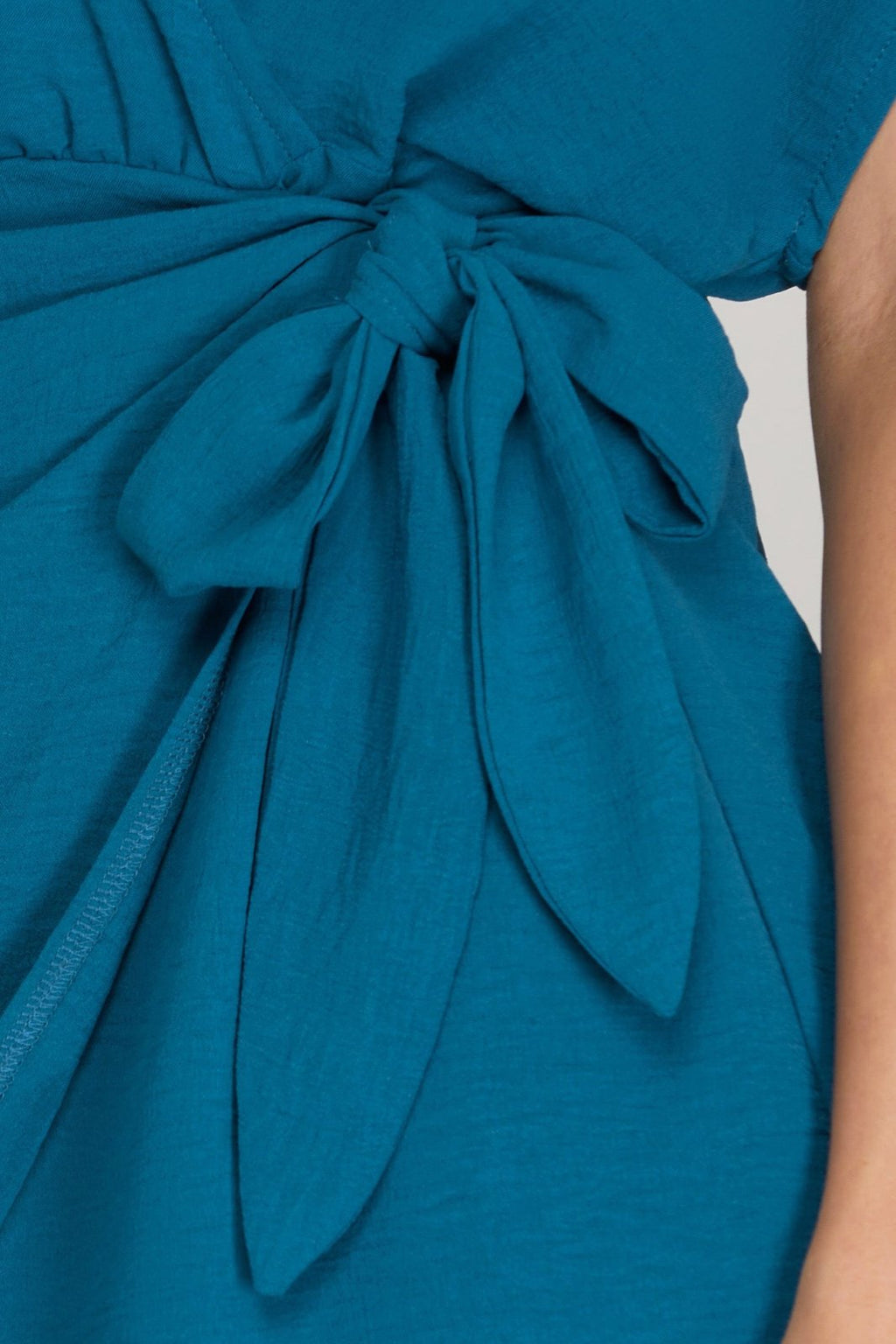 TEAL ME I'M PRETTY DRESS detail showcasing the tie and fabric texture, perfect for summer outfits Texas at Raggdoll Boutique.
