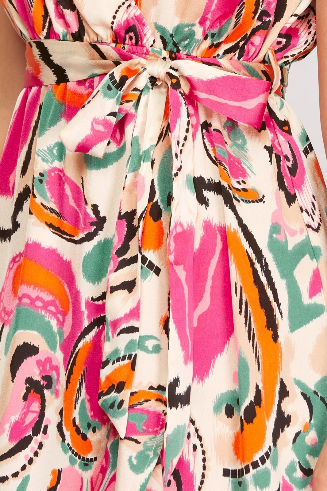 POP THE BUBBLY DRESS featured at Raggdoll Boutique with vibrant colors and a stylish tie waist for trendy coastal style.