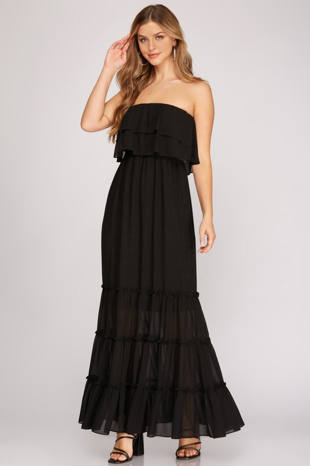 Stylish black strapless maxi dress with ruffles, ideal for beach outings from a Port Aransas boutique, perfect for curvy plus sizes.