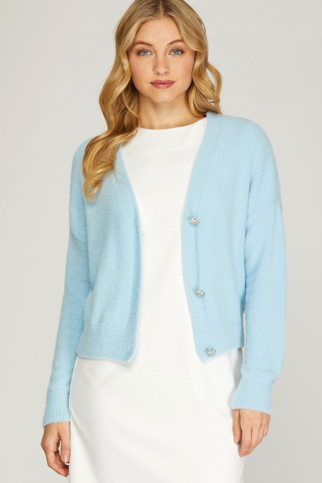 LT BLUE LONG SLEEVE FUZZY SWEATER CARDIGAN W/JEWEL BUTTONS from Raggdoll Boutique in trendy coastal style.
