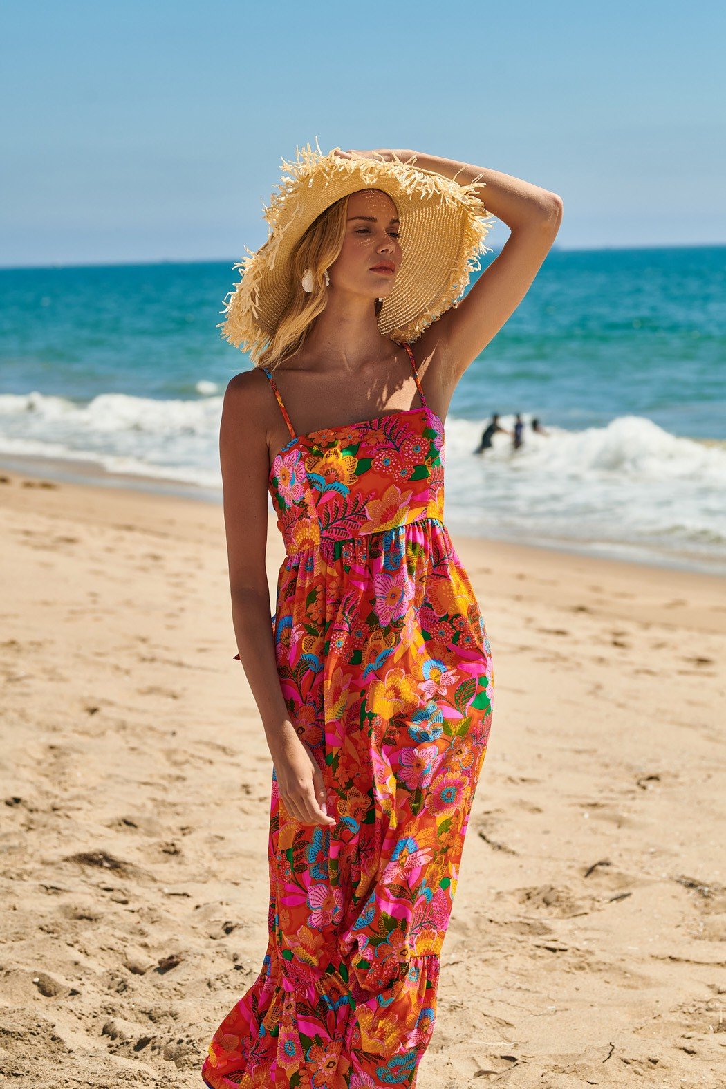IDALIA TIE BACK MAXI DRESS on a model at the beach, perfect for summer outfits Texas from Raggdoll Boutique.