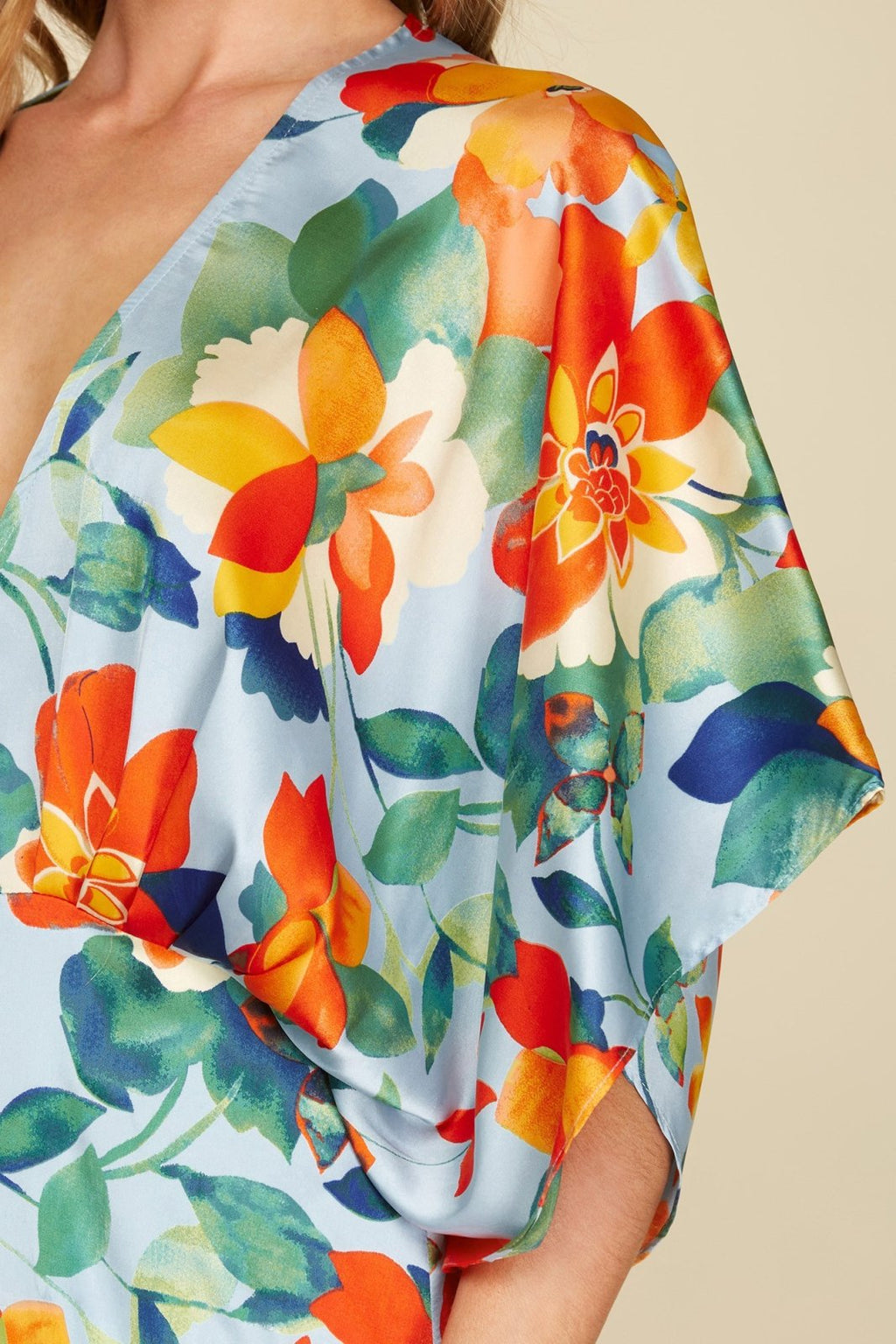 DOSE OF DRAMA DRESS featuring vibrant floral print, perfect for summer outfits at Raggdoll Boutique in Port Aransas.