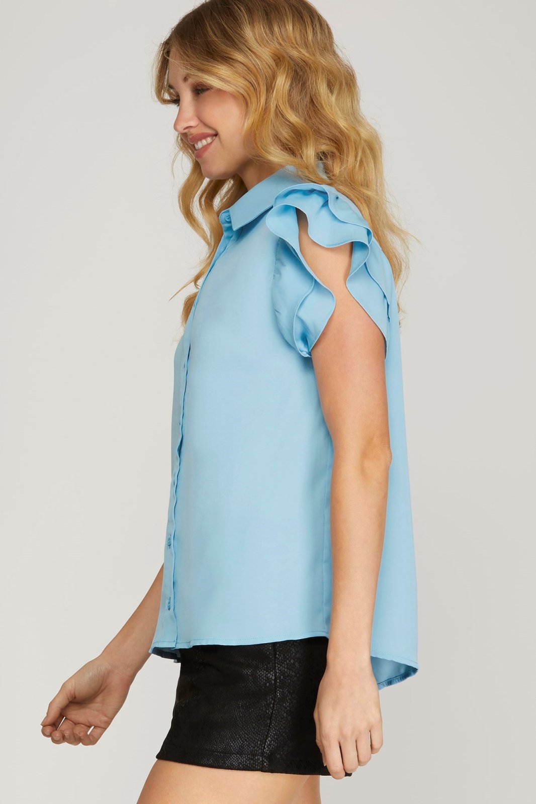 Sky blue flutter sleeve top, perfect for coastal boutique clothing and beach dresses at Port Aransas boutique.