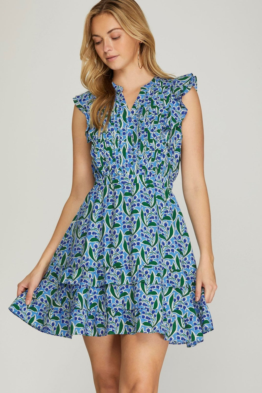 Hours of Flowers Dress from Raggdoll Boutique showcases trendy coastal style, perfect for summer outfits in Port Aransas.
