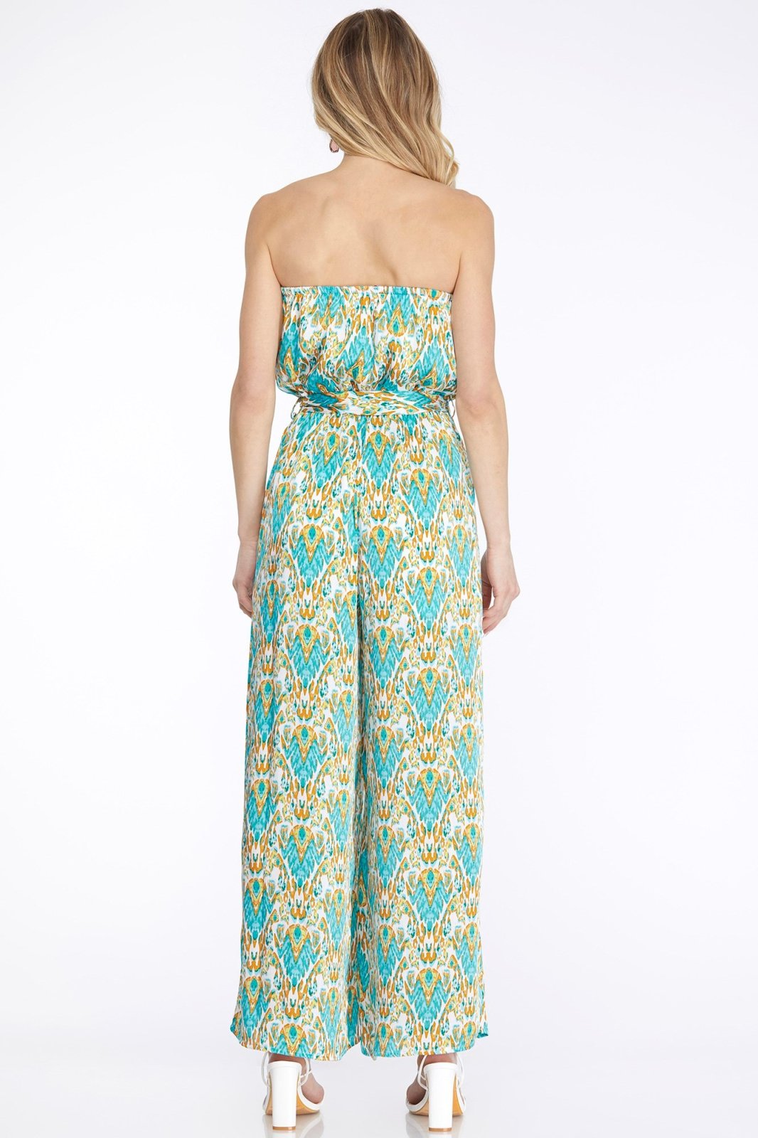 Back view of Aqua and Yellow Print Strapless Jumpsuit with waist tie, featuring a vibrant coastal pattern.