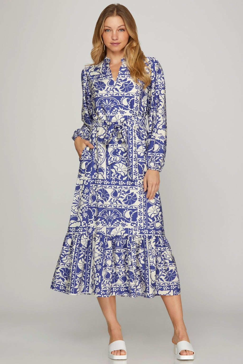 BRITNI DRESS in blue floral print, perfect for coastal boutique clothing and tropical vacation dresses.