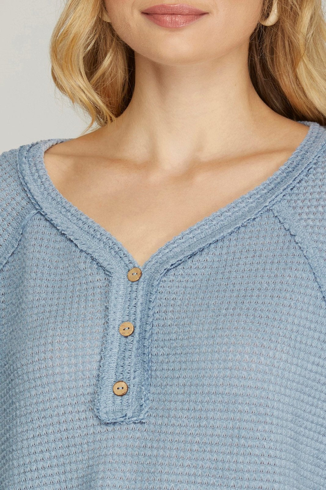 Misty blue oversized thermal top with buttons, curated for coastal boutique clothing and stylish women's fashion.