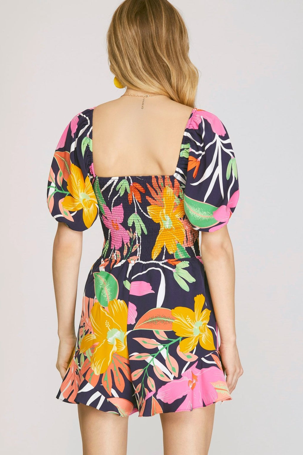 Navy with Tropical Print Romper back view featuring colorful floral design, perfect for summer outfits Texas.