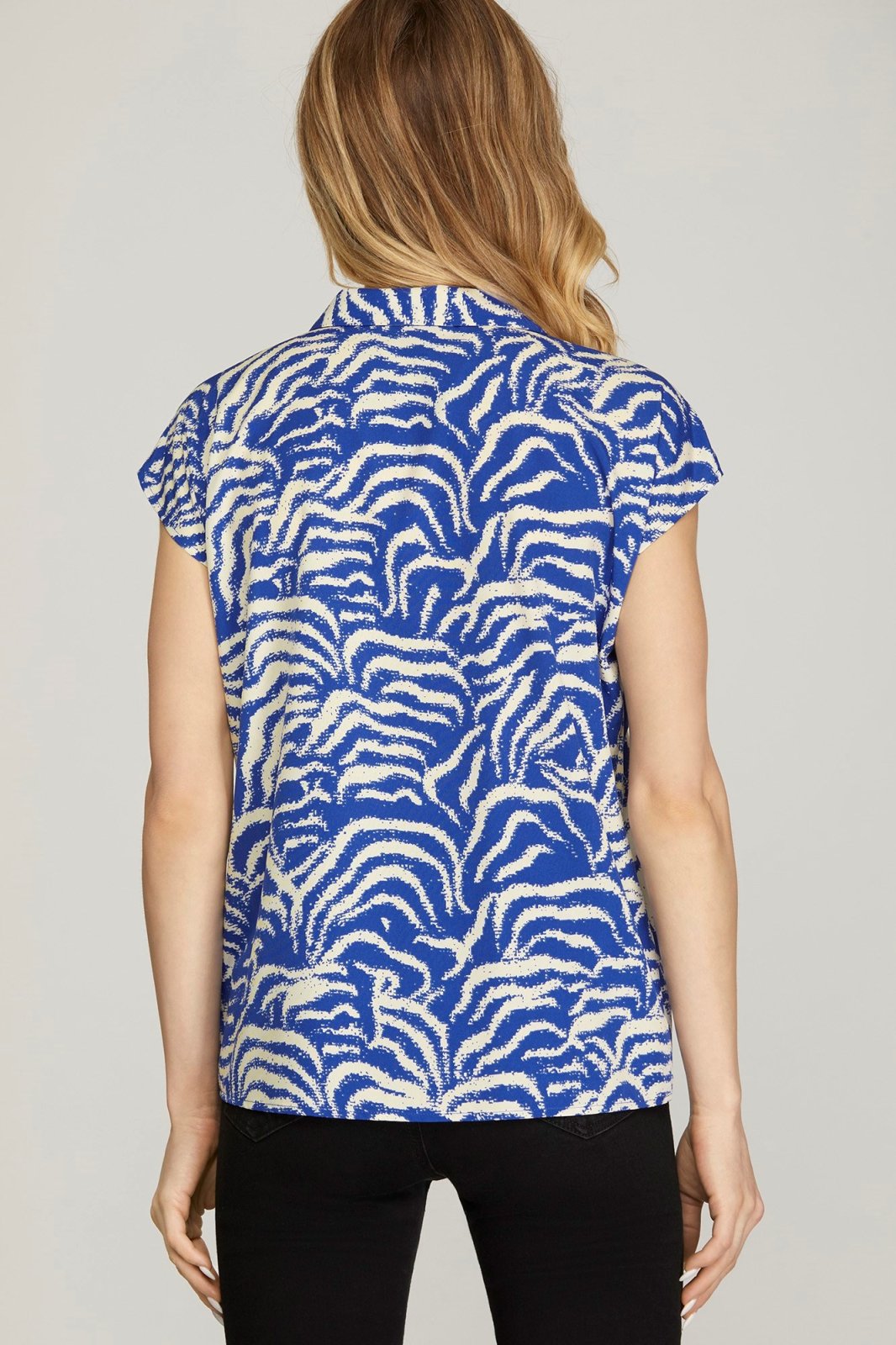 Back view of ROYAL BLUE PATTERNED TOP featuring a stylish design, perfect for summer outfits Texas and coastal fashion boutique.