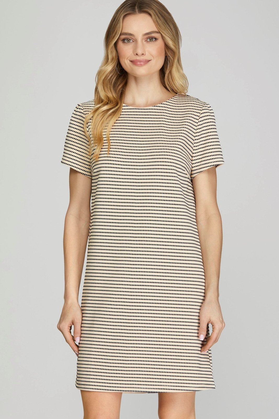 Everly Dress from Raggdoll Boutique, featuring a trendy striped design, perfect for summer outfits in Port Aransas.