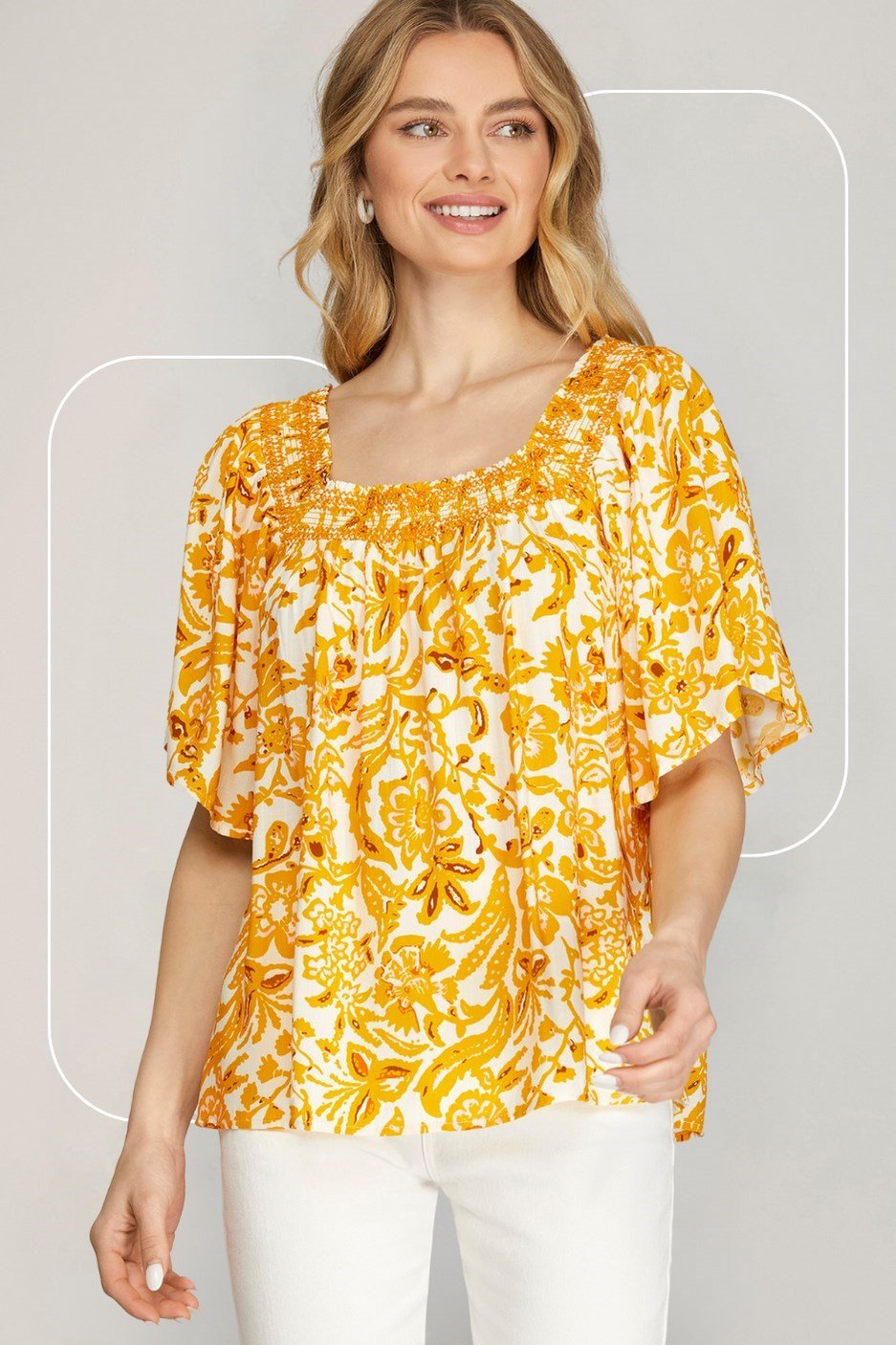 Sunflower Top from Raggdoll Boutique in vibrant yellow floral print, perfect for trendy coastal style.