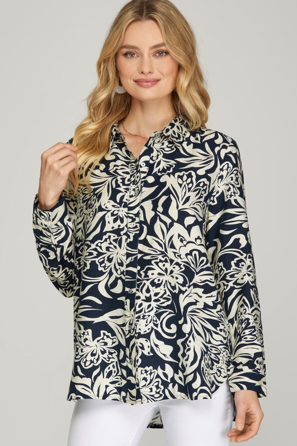 Navy and ivory floral button down top, perfect for coastal boutique clothing and stylish women's fashion from Port Aransas.