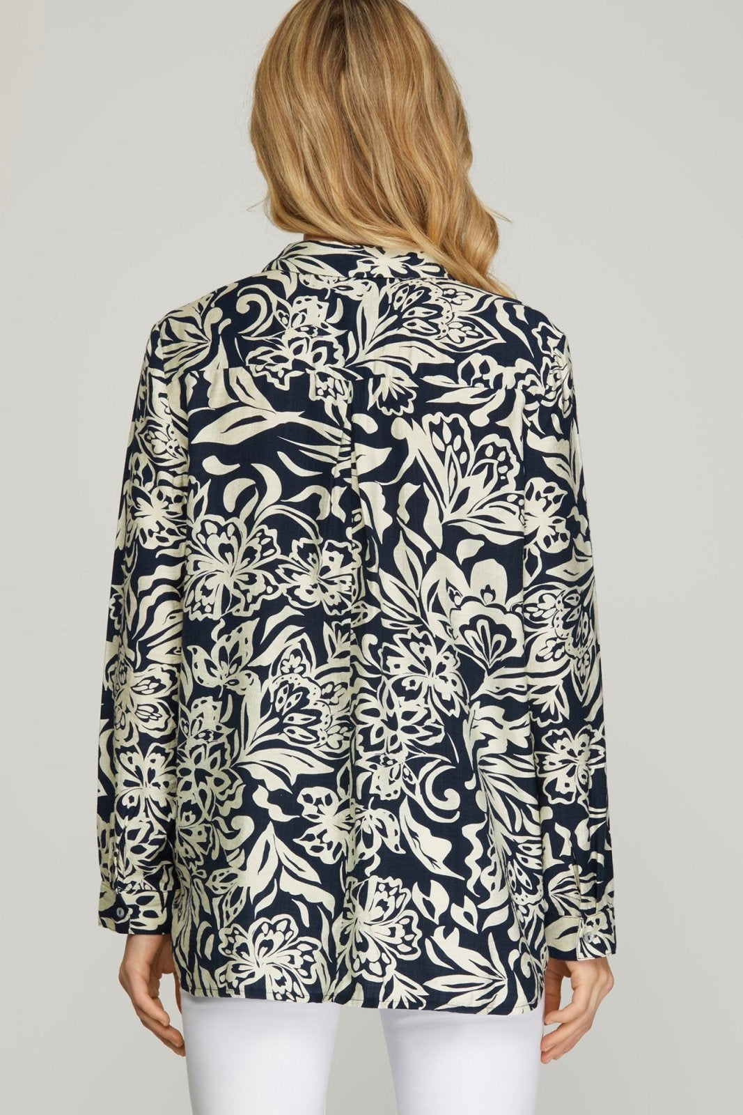 Stylish navy and ivory button down top for women, ideal for coastal boutique clothing and tropical vacation dresses.