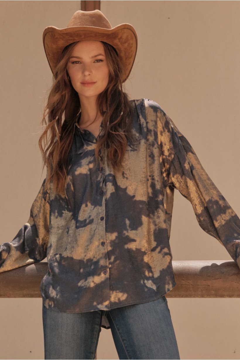 Stylish coastal boutique clothing featuring a tiedye top, perfect for tropical vacation dresses or casual outings.
