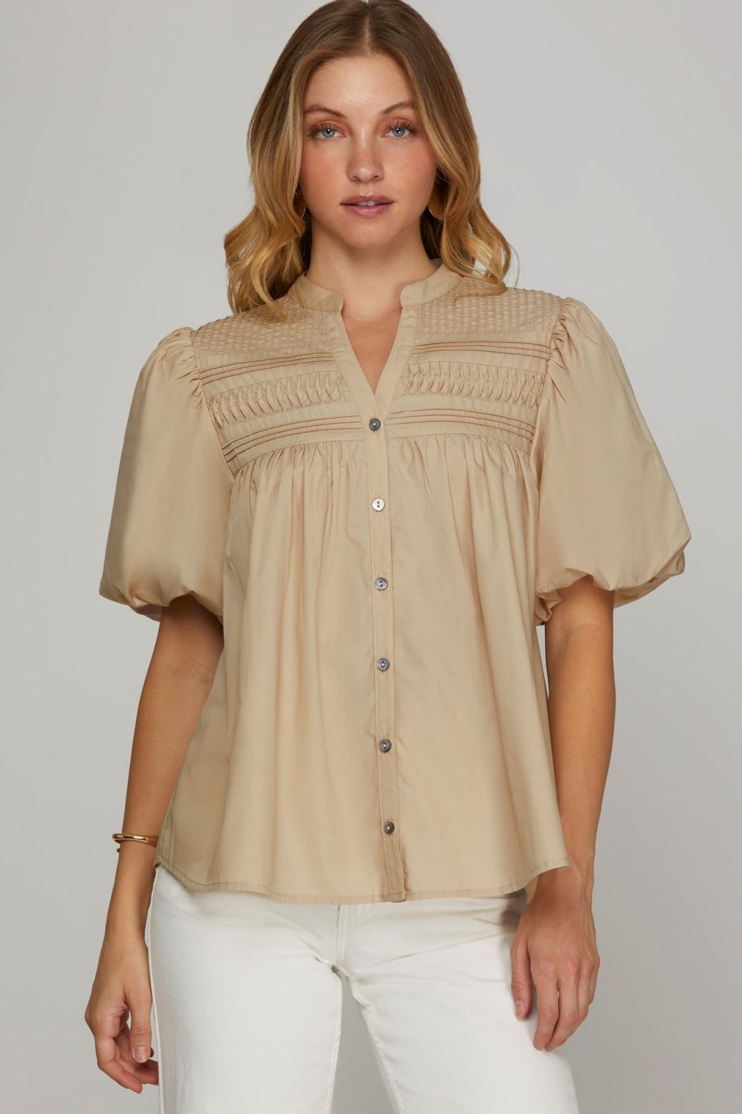 Taupe woven top, perfect for coastal boutique clothing. Stylish choice for Port Aransas beach boutiques and tropical vacations.