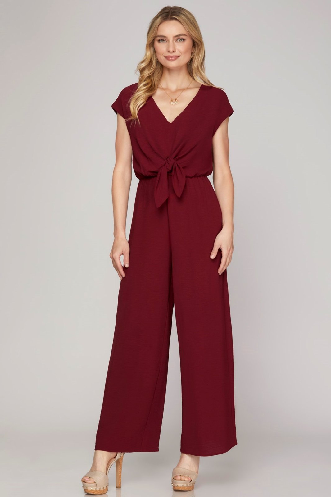 Stylish wine jumpsuit for women, perfect for tropical vacations. Shop curated women's fashion at our coastal boutique.