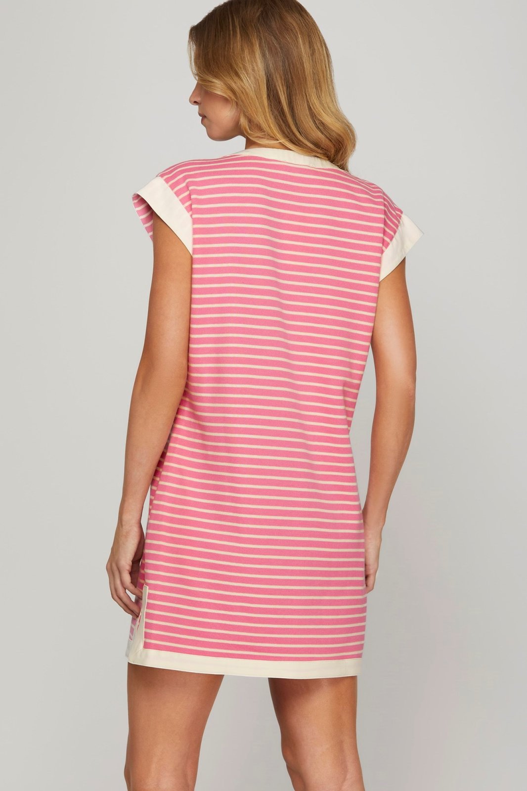 Stylish Sweetie Dress featuring pink stripes, perfect for coastal boutique clothing and tropical vacations.