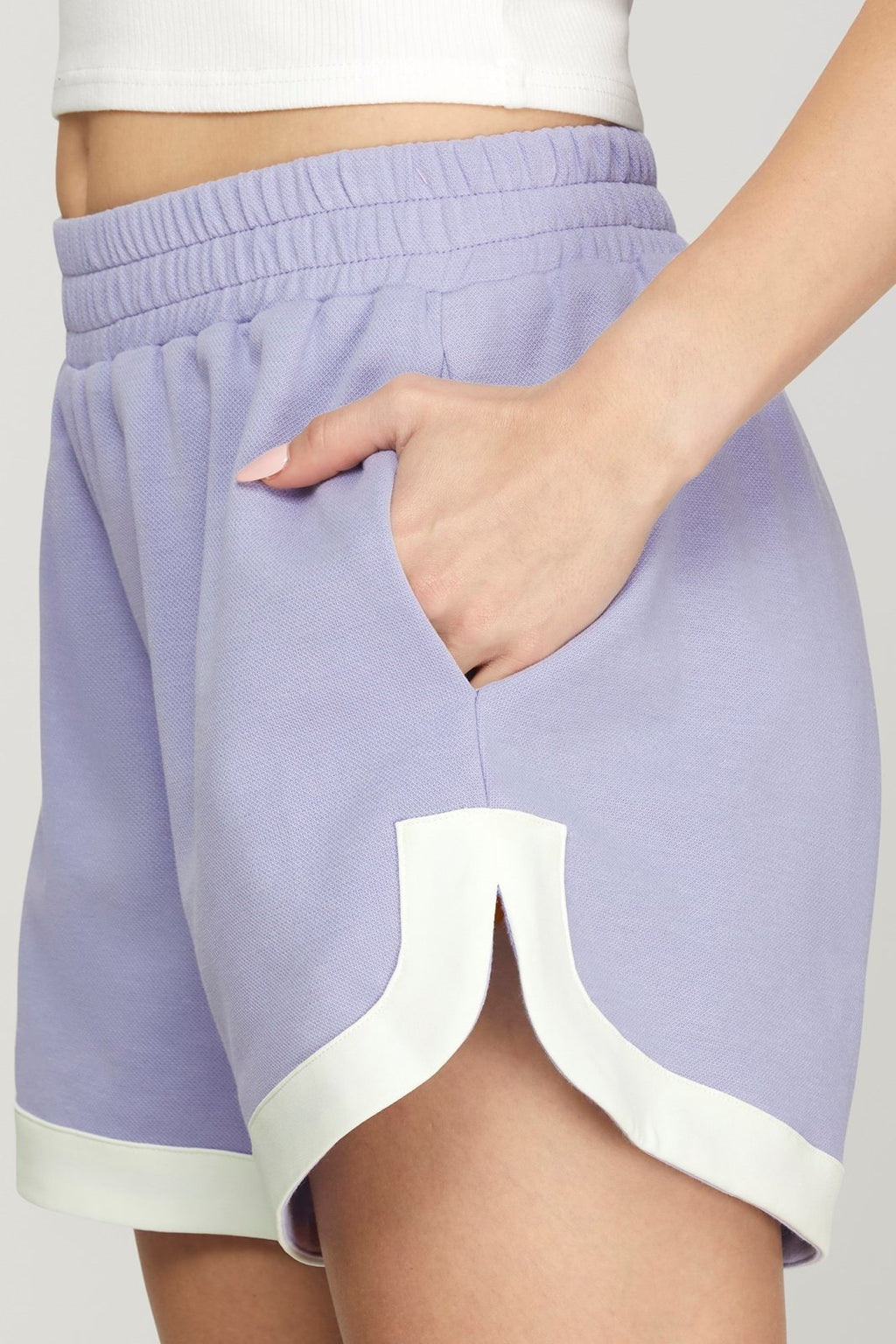 Periwinkle short set featuring stylish pocket details, perfect for coastal boutique clothing and casual summer outings.