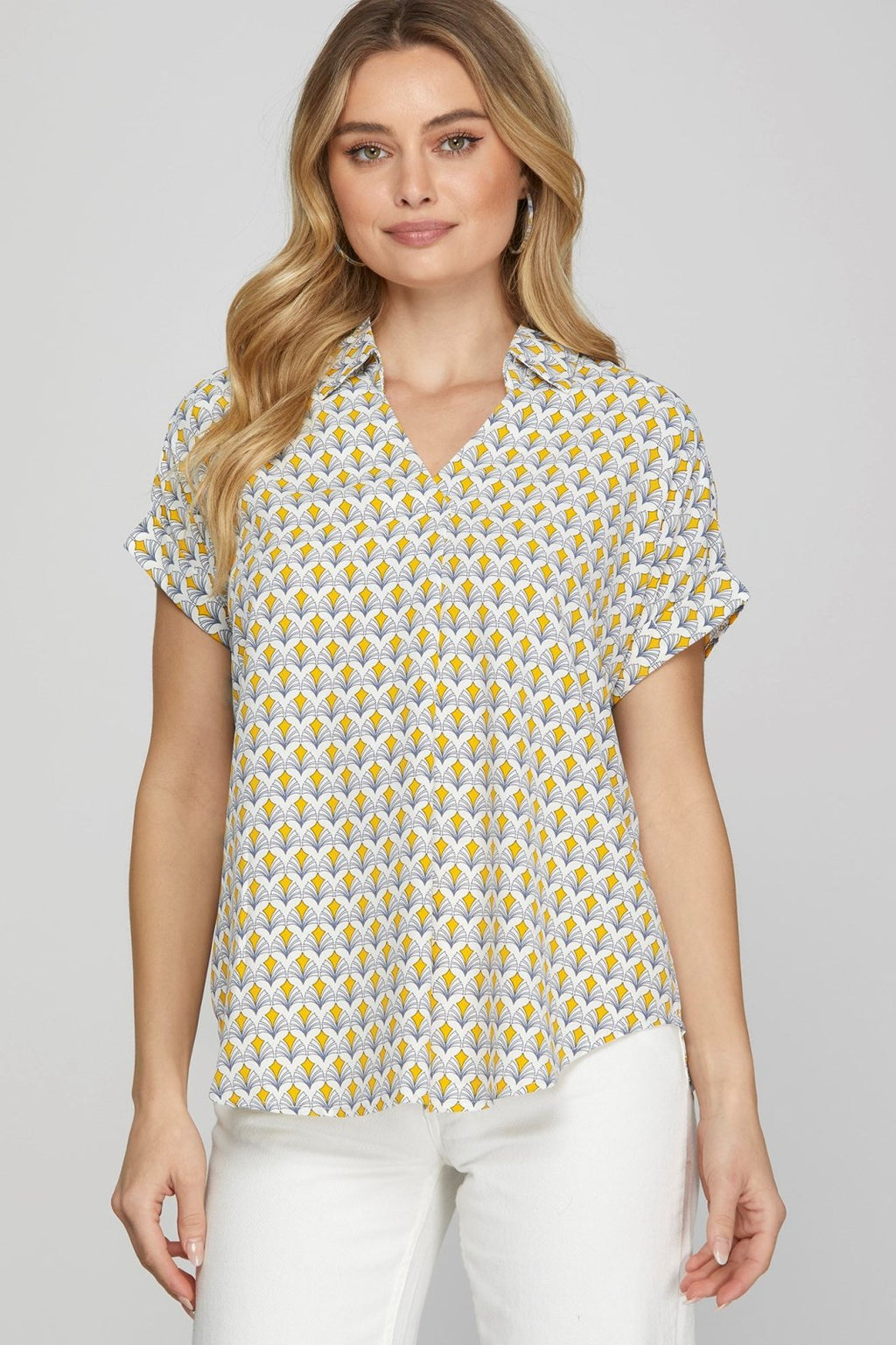 Stylish Lois Top in vibrant print, ideal for coastal boutique clothing and summer beach dresses. Perfect for Port Aransas.