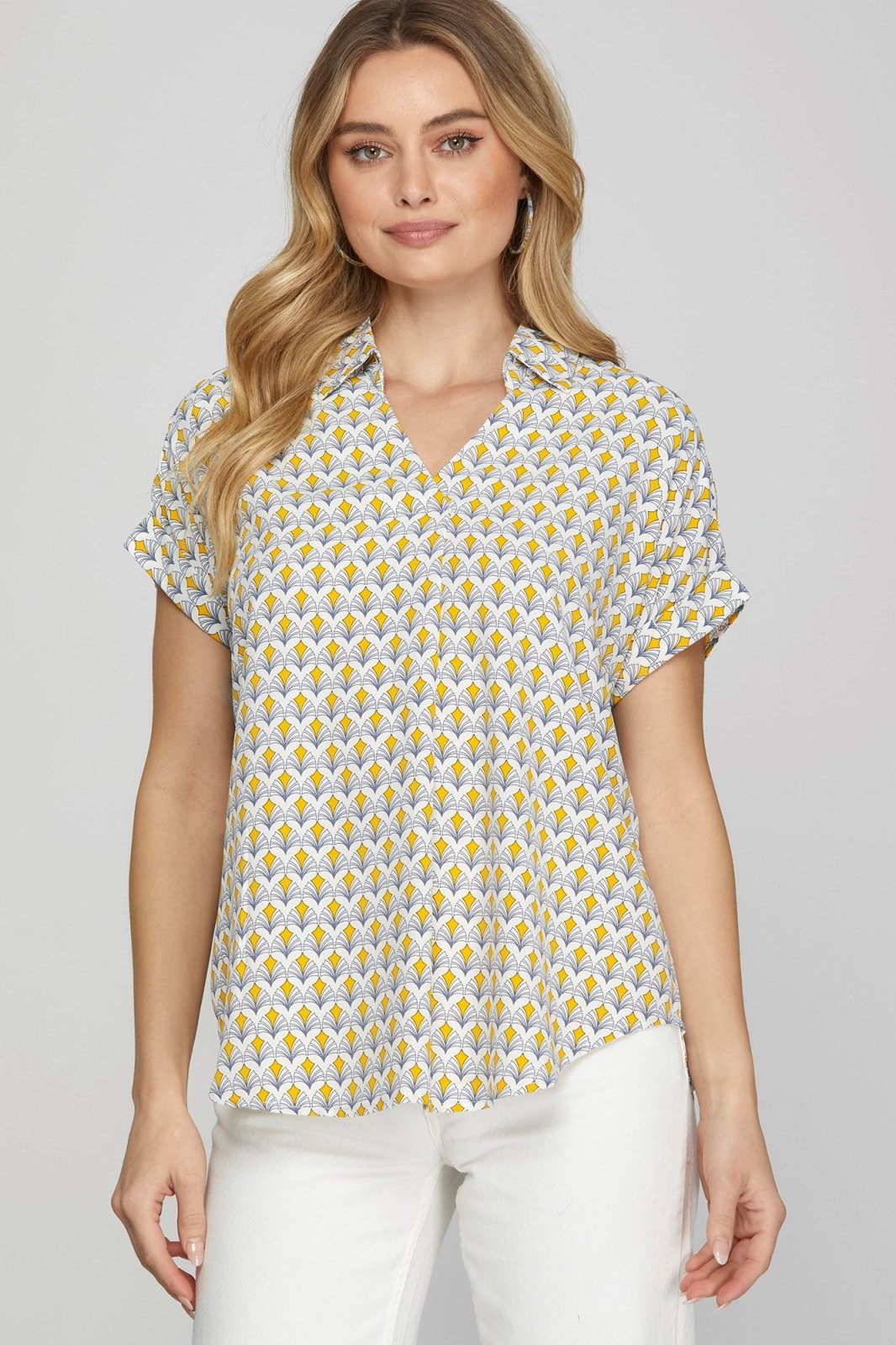 Stylish Lois Top in vibrant print, ideal for coastal boutique clothing and summer beach dresses. Perfect for Port Aransas.