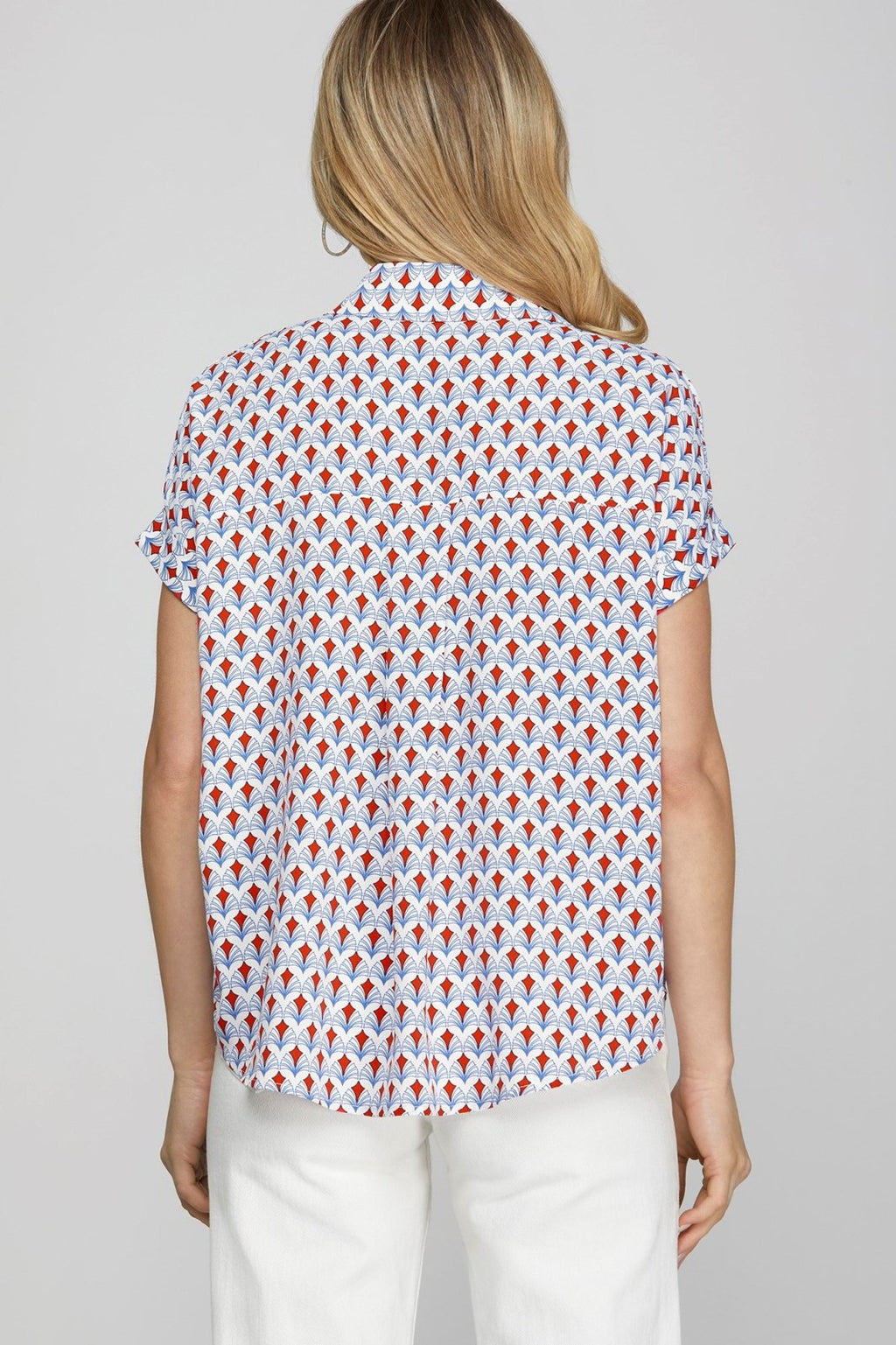 Back view of the Carol Top featuring a colorful pattern, perfect for coastal boutique clothing and stylish tops for women.