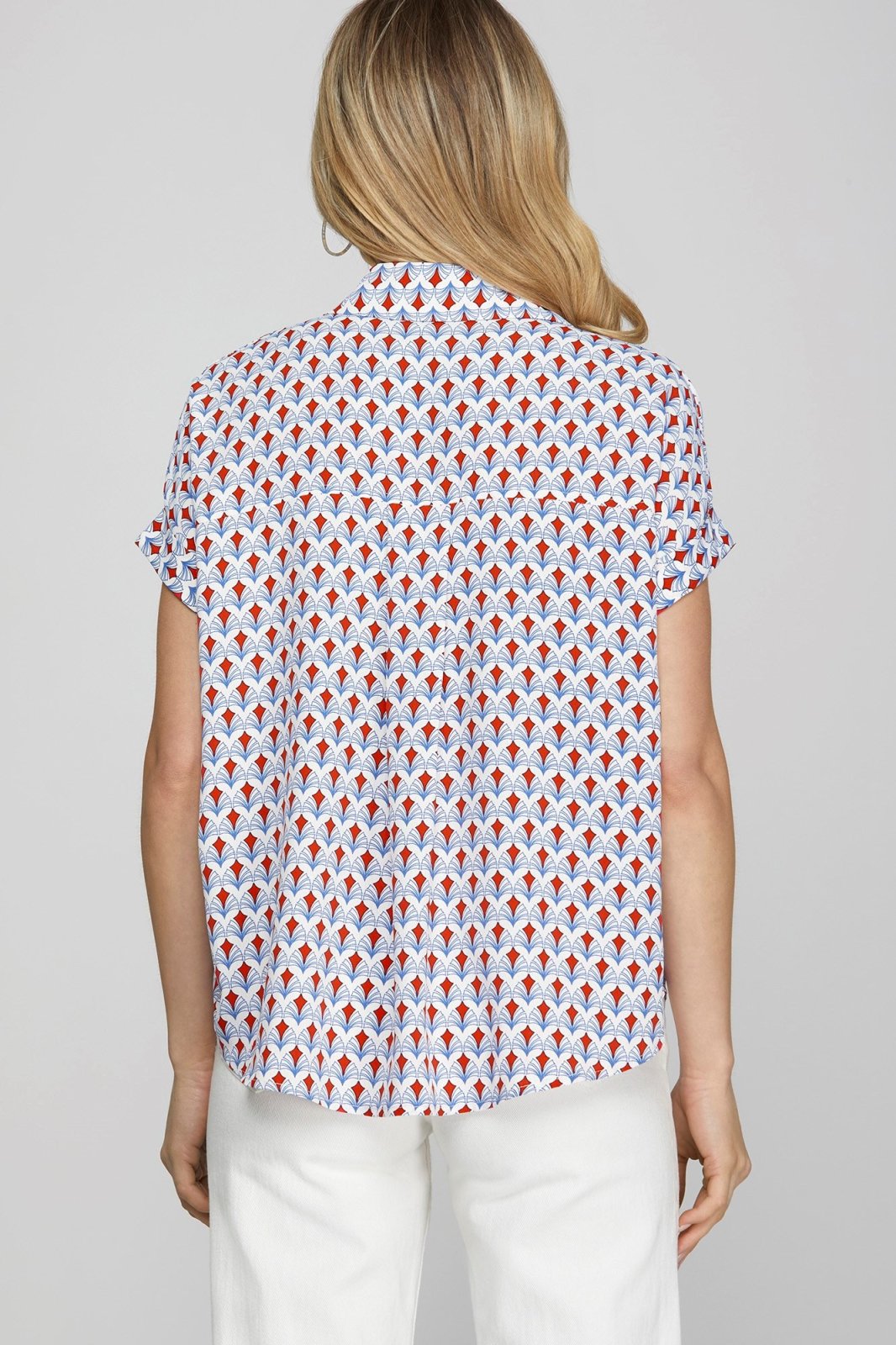 Back view of the Carol Top featuring a colorful pattern, perfect for coastal boutique clothing and stylish tops for women.