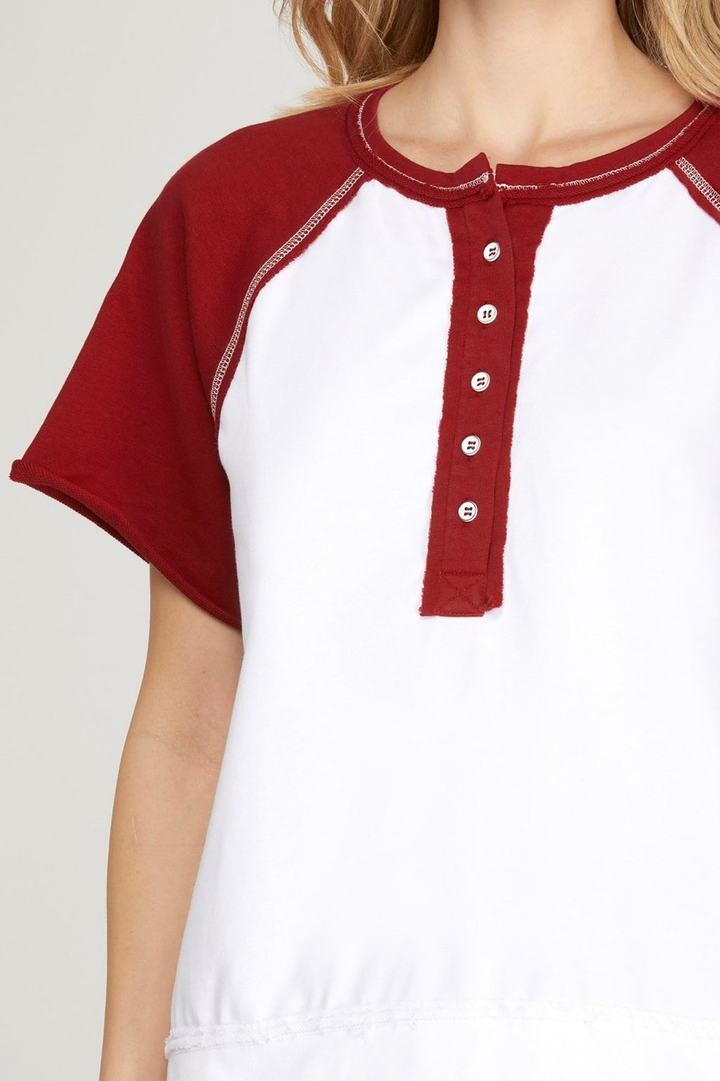 Stylish Maroon Game Day Top showcasing button-up design and contrast raglan sleeves, perfect for beach outings and tailgates.