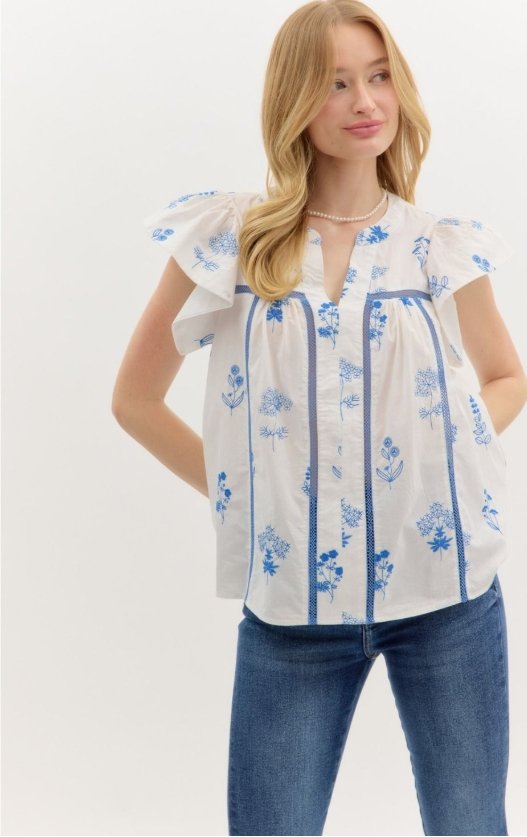 Scarlet Top in Blue - Blue floral print flutter sleeve top from Raggdoll Boutique, perfect for summer outfits Texas.