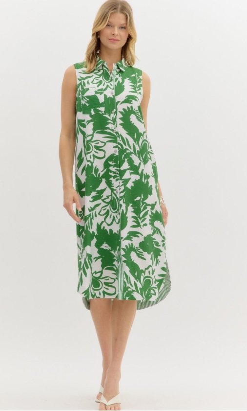 Lucia Dress from Raggdoll Boutique featuring a green tropical print, perfect for summer outfits in Texas and vacation wardrobe boutique.