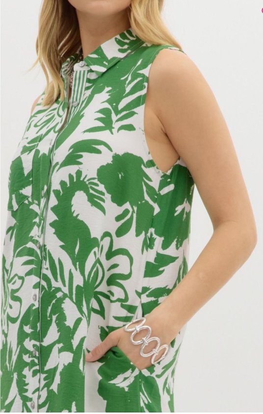 Lucia Dress in green tropical print, sleeveless design from Raggdoll Boutique, perfect for summer outfits Texas.