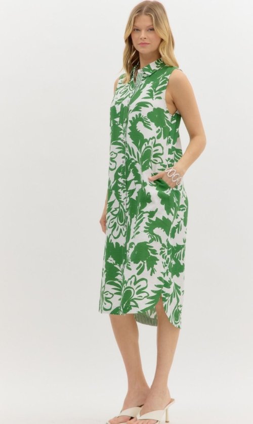 Lucia Dress featuring a vibrant green tropical print, perfect for summer outfits Texas from Raggdoll Boutique.