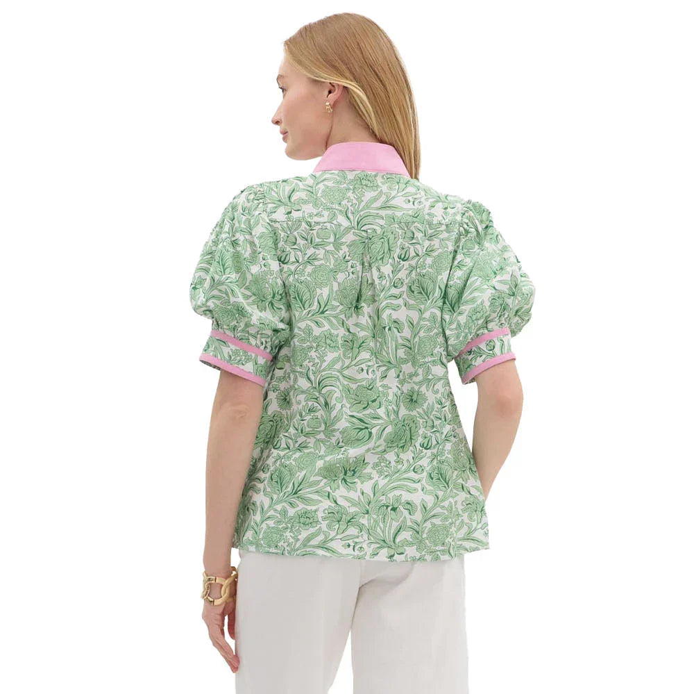 Stylish green floral plus size blouse with pink accents, perfect for coastal boutique clothing and tropical vacation attire.
