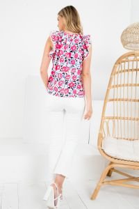 PINK AND NAVY BLOSSOM TOP showcasing vibrant floral print, perfect for summer outfits Texas, from Raggdoll Boutique.
