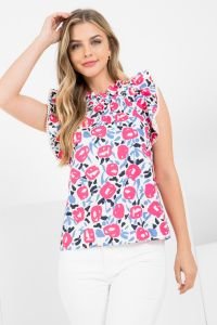 Stylish pink and navy blossom top, perfect for coastal boutique clothing and curated women's fashion. Ideal for tropical vacations.