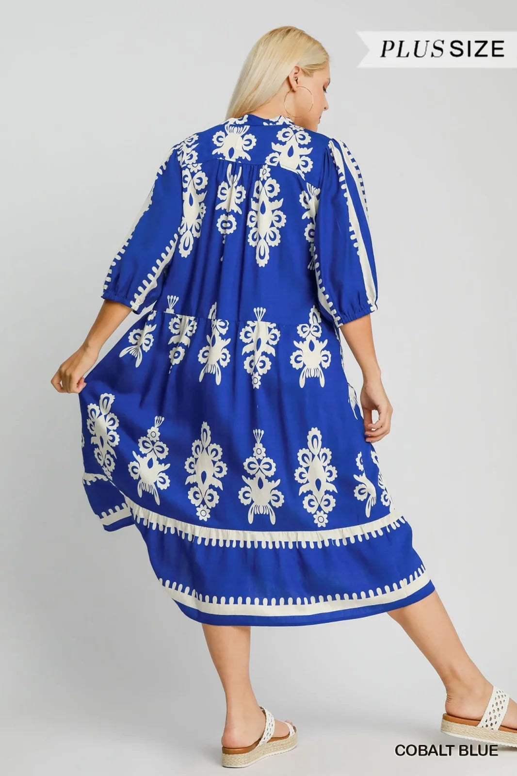 Cobalt blue plus size Uma Dress featuring elegant white patterns, perfect for coastal boutique clothing and tropical vacations.