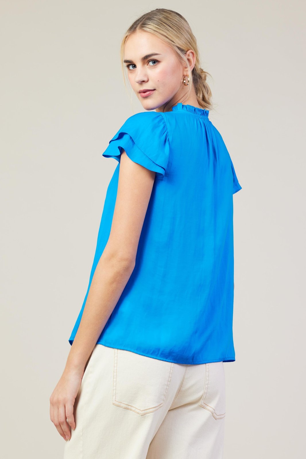 Vibrant blue top ideal for casual outings or office wear, from a Port Aransas boutique, part of curated women's fashion collection.
