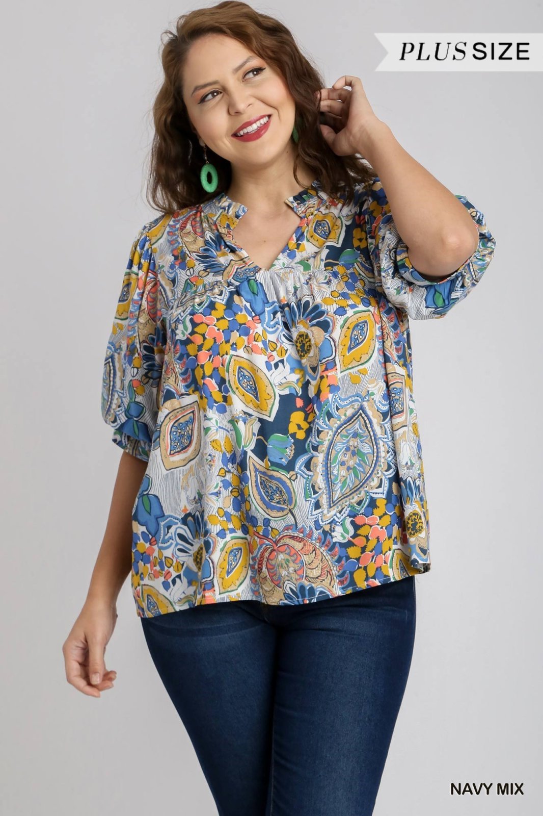 Plus size navy mix floral top, perfect for coastal boutique clothing and tropical vacation dresses. Stylish women's fashion.