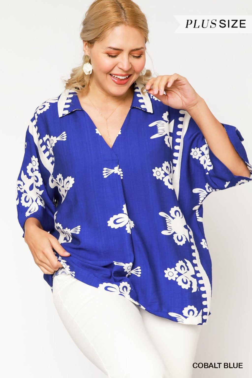 Plus Cobalt Print Top shown on model, featuring bold cobalt blue and white border print, ideal for summer outfits Texas.