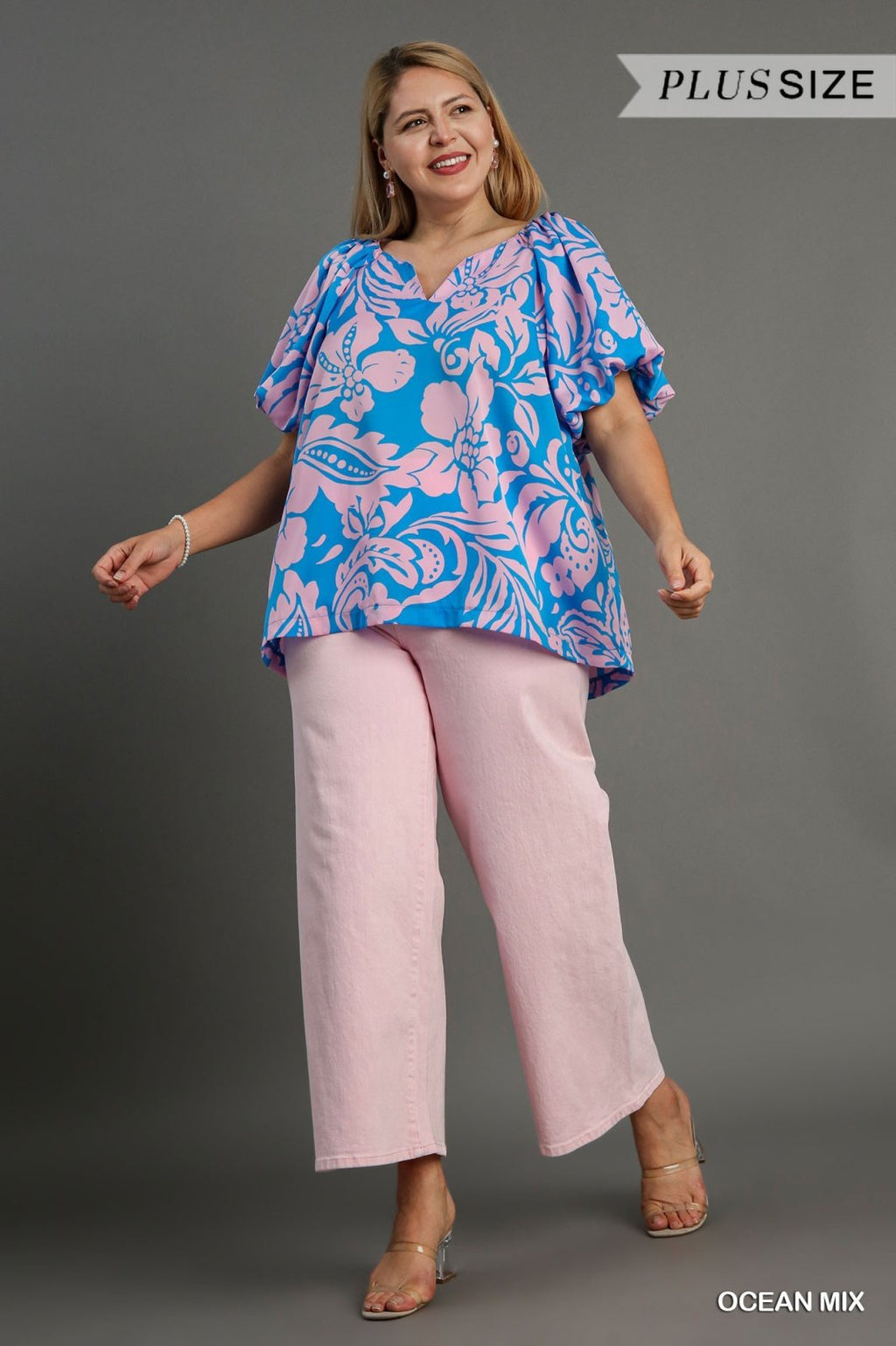 Stylish PLUS OCEAN TOP featured in coastal boutique clothing, ideal for tropical vacations and curvy women's fashion.