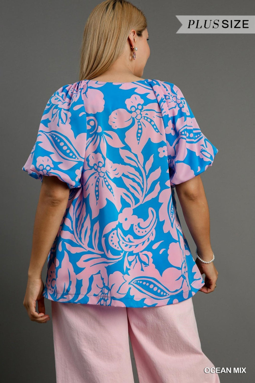 Stylish plus size ocean mix top with floral print, perfect for coastal boutique clothing and tropical vacation dresses.